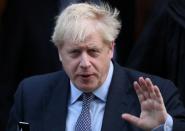 Britain's Prime Minister Boris Johnson leaves Downing Street to head for the House of Commons as parliament discusses Brexit, sitting on a Saturday for the first time since the 1982 Falklands War, in London