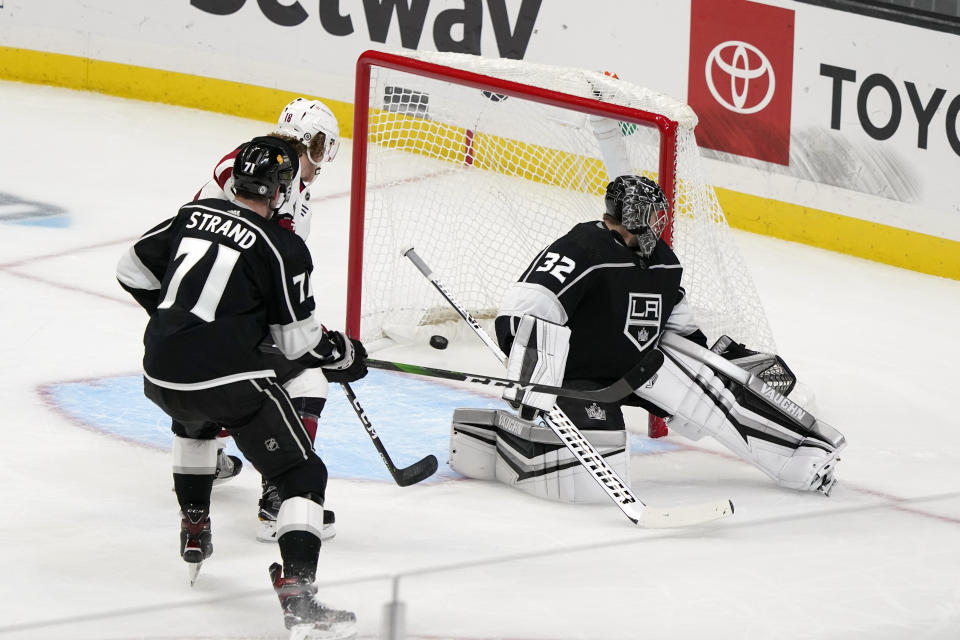Los Angeles Kings goaltender Jonathan Quick (32) gives up a goal on a shot from Arizona Coyotes' Ilya Lyubushkin, not seen, during the first period of an NHL hockey game Wednesday, April 7, 2021, in Los Angeles. (AP Photo/Marcio Jose Sanchez)