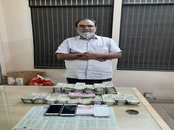 A man held for illegal hawala transaction. (Photo/ANI)