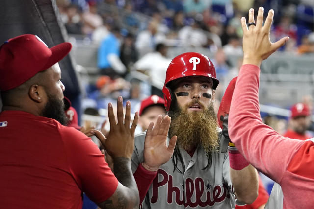 Walker first in majors to 12 wins as Phillies beat Marlins