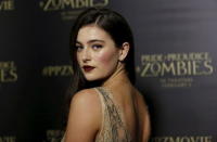 Cast member Millie Brady poses at the premiere of "Pride and Prejudice and Zombies" in Los Angeles, California January 21, 2016. REUTERS/Mario Anzuoni