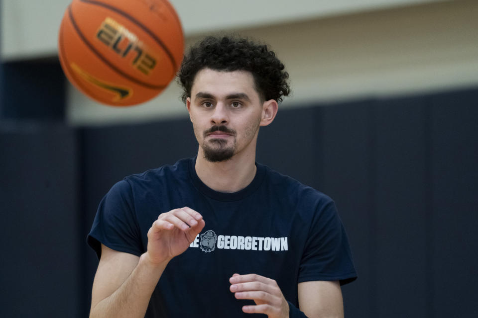 Georgetown NCAA college basketball forward Ismael Massoud catches a pass during practice, Thursday, Oct. 19, 2023, in Washington. (AP Photo/Stephanie Scarbrough)