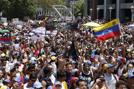 Anti-government protesters march during a demonstration in Caracas March 12, 2014.REUTERS/Carlos Garcia Rawlins