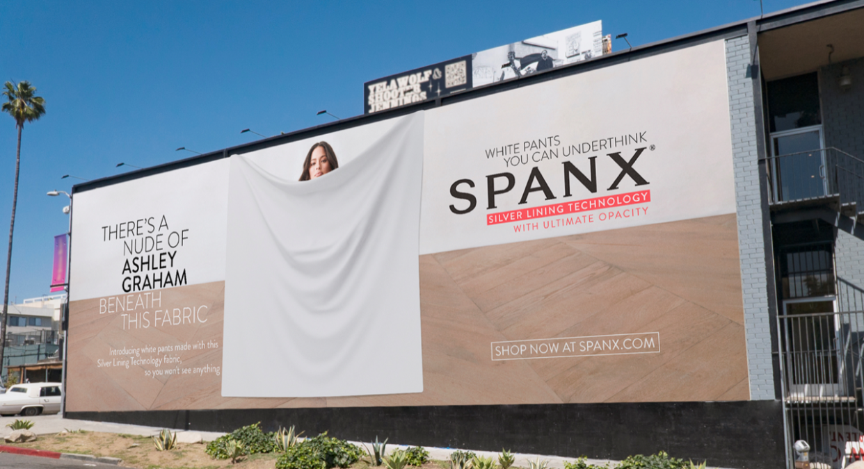 Ashley Graham strips down for a new billboard. (Photo: Spanx)