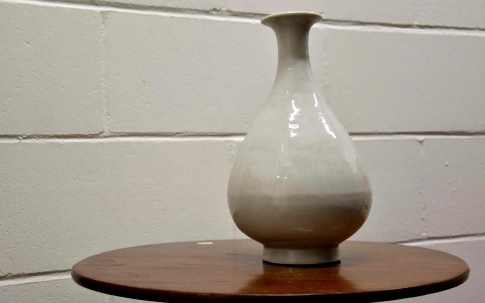 A stolen 15th century Chinese Ming Dynasty vase which has been recovered by the Metropolitan Police during a Specialist Crime operation - Metropolitan Police