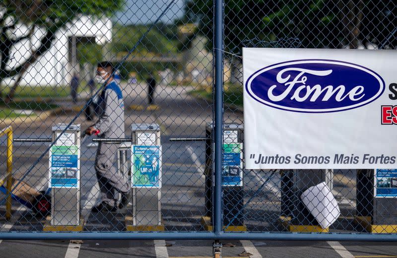 FILE PHOTO: Workers protest at Ford Motor Co's plant in Taubate