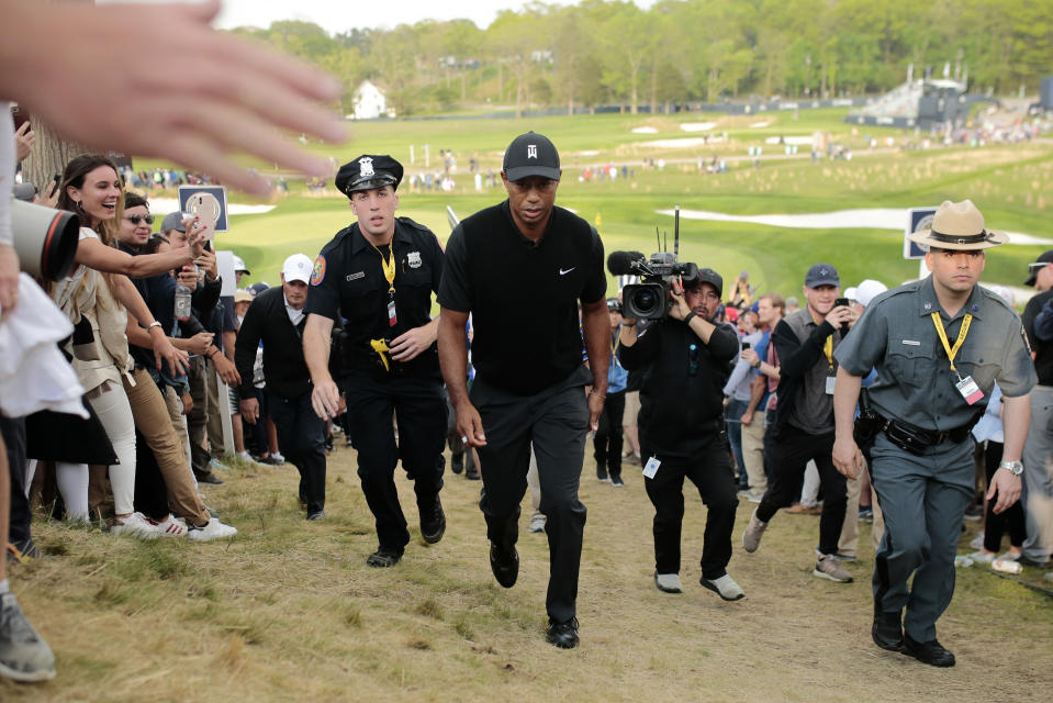 Tiger Woods walks up to the 18th tee during the second round of the PGA Championship golf tournament, Friday, May 17, 2019, at Bethpage Black in Farmingdale, N.Y. (AP Photo/Andres Kudacki)