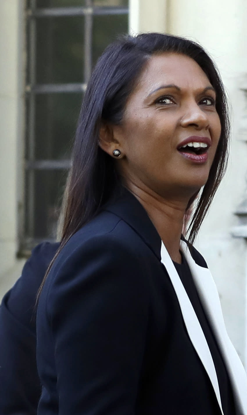 Ant-Brexit campaigner Gina Miller, centre leaves the Supreme Court in London, Wednesday, Sept. 18, 2019. The Supreme Court is set to decide whether Prime Minister Boris Johnson broke the law when he suspended Parliament on Sept. 9, sending lawmakers home until Oct. 14 — just over two weeks before the U.K. is due to leave the European Union. (AP Photo/Kirsty Wigglesworth)