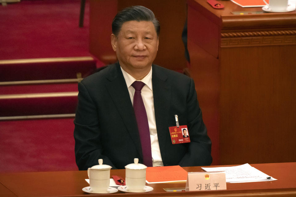 Chinese President Xi Jinping attends a session of China's National People's Congress (NPC) at the Great Hall of the People in Beijing, Friday, March 10, 2023. Chinese leader Xi Jinping was awarded a third five-year term as president Friday, putting him on track to stay in power for life at a time of severe economic challenges and rising tensions with the U.S. and others. (AP Photo/Mark Schiefelbein)