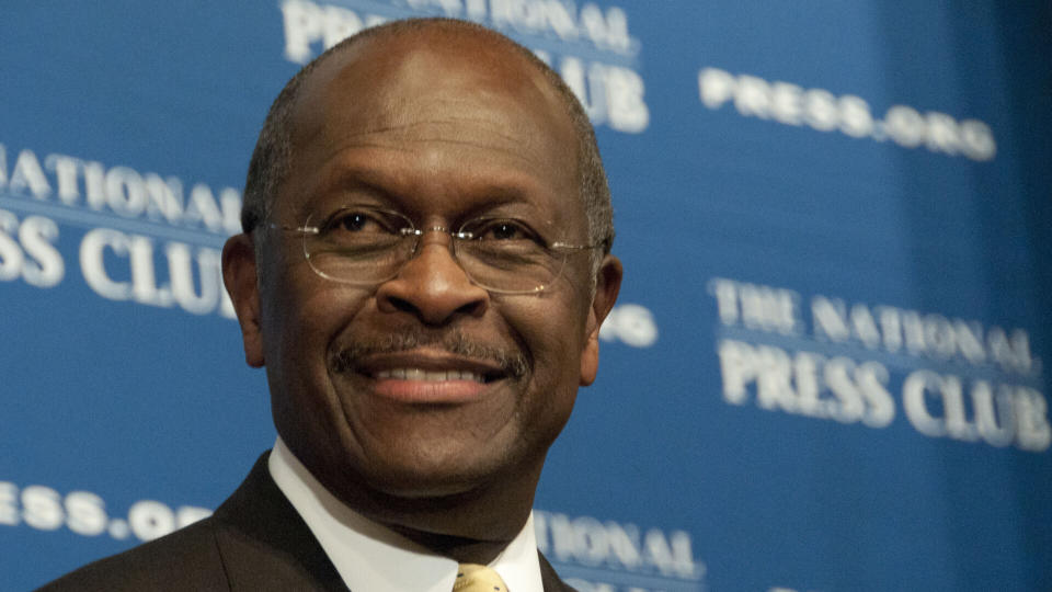 Republican Presidential contender Herman Cain speaks to a luncheon at the National Press Club, October 31, 2011 in Washington, DC