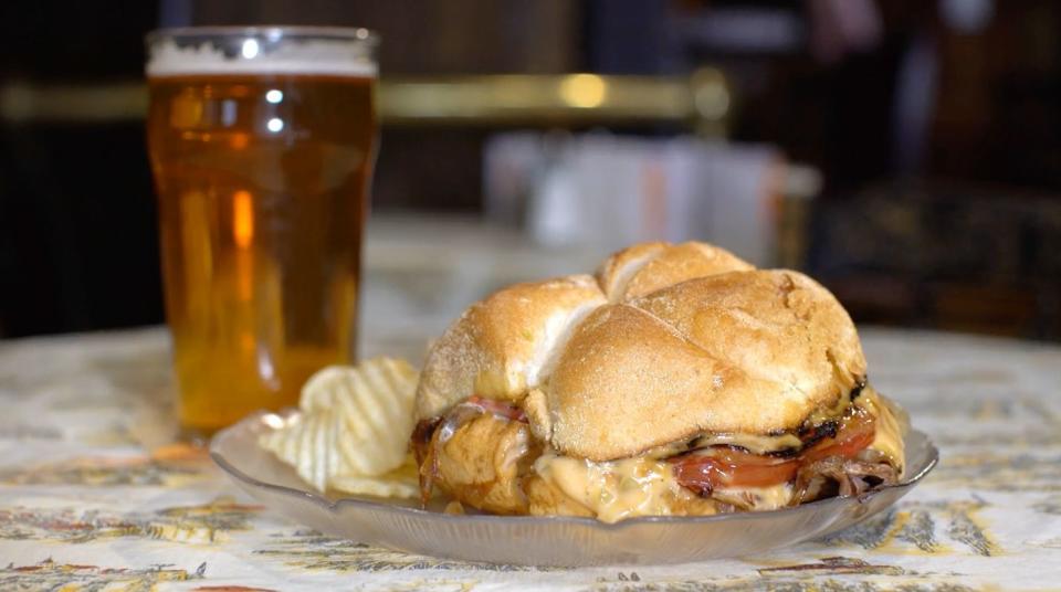 No self-respecting cheesesteak is on a kaiser bun with tomato, grilled salami and dressed in a Thousand Island-y type sauce. This sandwich includes all that. (Photo: McNally's)