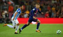 Soccer Football - La Liga Santander - FC Barcelona vs Malaga CF - Camp Nou, Barcelona, Spain - October 21, 2017 Barcelona’s Gerard Deulofeu in action with Malaga's Juan Carlos REUTERS/Albert Gea