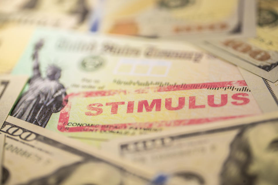 Scammers try to catch you off guard as you anticipate of your stimulus payment. (Photo: Getty)