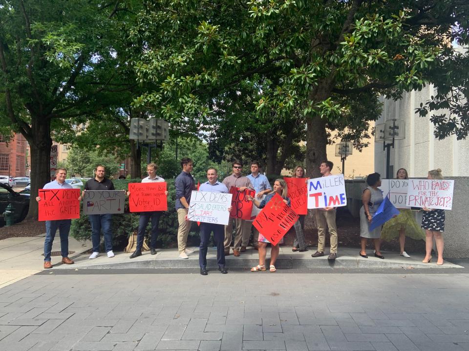 Protesters have their say outside Texas Democrats' Washington hotel July 14.