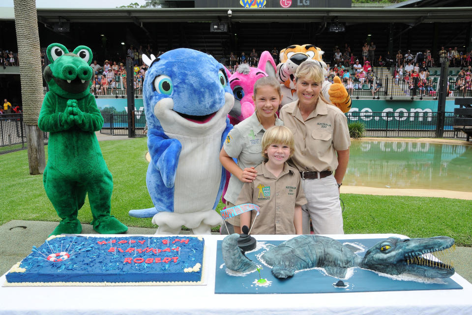 In this handout photo provided by Australia Zoo, Robert Irwin celebrates his eighth birthday with sister Bindi (L) and mother Terri Irwin, at Australia Zoo, on December 1, 2011 in Beerwah, Australia. (Photo by Australia Zoo via Getty Images)