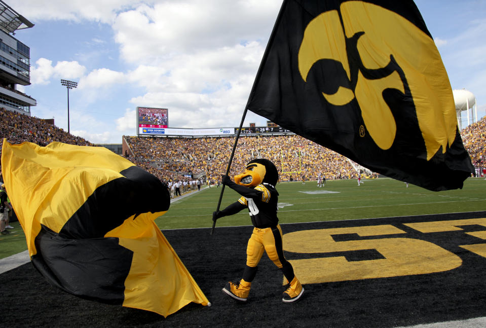 IOWA CITY, IOWA- SEPTEMBER 3:  Mascot Herky the Hawk of the Iowa Hawkeyes carries a flag during the match-up against the Miami (OH) RedHawks on September 3, 2016 at Kinnick Stadium in Iowa City, Iowa.  (Photo by Matthew Holst/Getty Images)