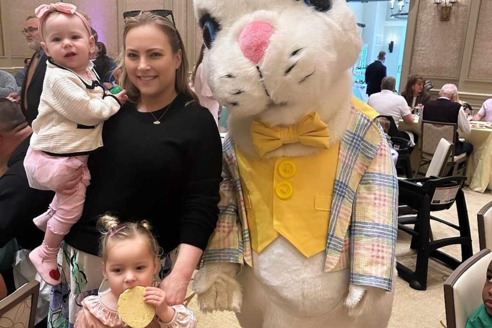 <p>Meghan McCain/Instagram</p> Meghan McCain holding daughters Clover and Liberty Sage while posing with an Easter bunny