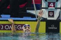 Regan Smith waves after winning the 100-meter backstroke at the U.S. national championships swimming meet, Friday, June 30, 2023, in Indianapolis. (AP Photo/Darron Cummings)