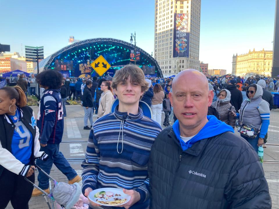 Zach Lorenc, 18, and his dad Shae Lorenc, 51, of Novi enjoy NFL draft day in Detroit, Thursday, Apr. 25, 2024