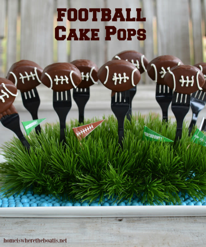 <p>Home is Where the Boat is</p><p><strong>Get the recipe: </strong><a href="https://homeiswheretheboatis.net/2016/02/05/keep-pounding-football-cake-pops/" rel="nofollow noopener" target="_blank" data-ylk="slk:Football Cake Pops;elm:context_link;itc:0;sec:content-canvas" class="link rapid-noclick-resp"><strong>Football Cake Pops</strong></a></p>