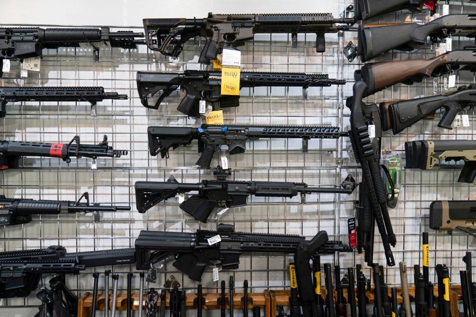 FILE - AR-15-style rifles are on display at Burbank Ammo & Guns in Burbank, California, June 23, 2022. (AP Photo/Jae C. Hong, File)