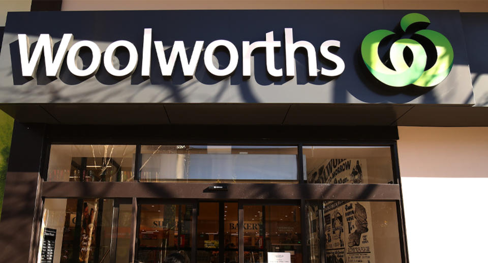 Photo shows the front of a Woolworths store. 