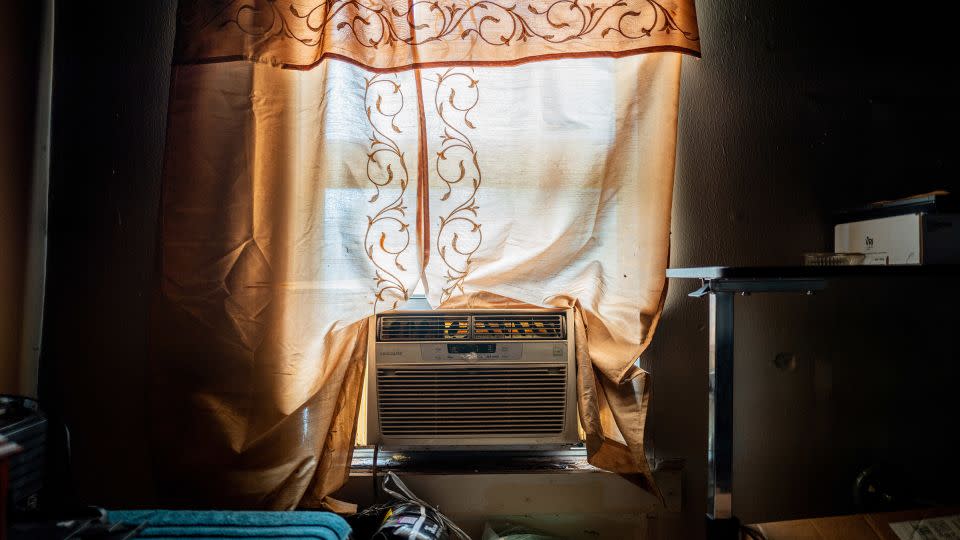 Larry Nelson's unpowered AC unit sits in the window seal of his home in the Third Ward neighborhood on Friday in Houston, Texas. - Brandon Bell/Getty Images