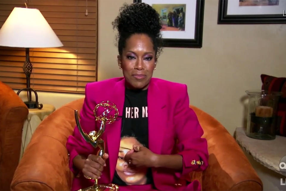 <p>The Emmy winner also honored Breonna Taylor with her ensemble at the 2020 ceremony. She first wore her <a href="https://phenomenalwoman.us/collections/justice-for-breonna/products/breonna-taylor-t-shirt" rel="nofollow noopener" target="_blank" data-ylk="slk:Phenomenal Woman T-shirt;elm:context_link;itc:0;sec:content-canvas" class="link ">Phenomenal Woman T-shirt</a> on Instagram, to demand justice for Taylor, then switched things up on Sunday <a href="https://people.com/style/emmys-2020-regina-king-honors-breonna-taylor-statement-t-shirt/" rel="nofollow noopener" target="_blank" data-ylk="slk:by wearing the shirt backwards;elm:context_link;itc:0;sec:content-canvas" class="link ">by wearing the shirt backwards</a>, to show Taylor's face and the words "SAY HER NAME" in capital letters.</p> <p>"It’s been 150 days since Breonna Taylor was murdered in her sleep by Jonathan Mattingly, Brett Hankison, and Myles Cosgrove — and her killers have not been charged. Too often Black women who die from police violence are forgotten," King wrote on <a href="https://www.instagram.com/p/CDty7-3AoA3/?utm_source=ig_embed" rel="nofollow noopener" target="_blank" data-ylk="slk:Instagram;elm:context_link;itc:0;sec:content-canvas" class="link ">Instagram</a>.</p> <p>"Let’s stay loud, keep demanding justice for Breonna and her family, and SAY HER NAME. This campaign and T-shirt was created by <a href="https://www.instagram.com/phenomenal/" rel="nofollow noopener" target="_blank" data-ylk="slk:@phenomenal;elm:context_link;itc:0;sec:content-canvas" class="link ">@phenomenal</a> in partnership with the Breonna Taylor Foundation, to which all profits will be donated," she continued.</p>