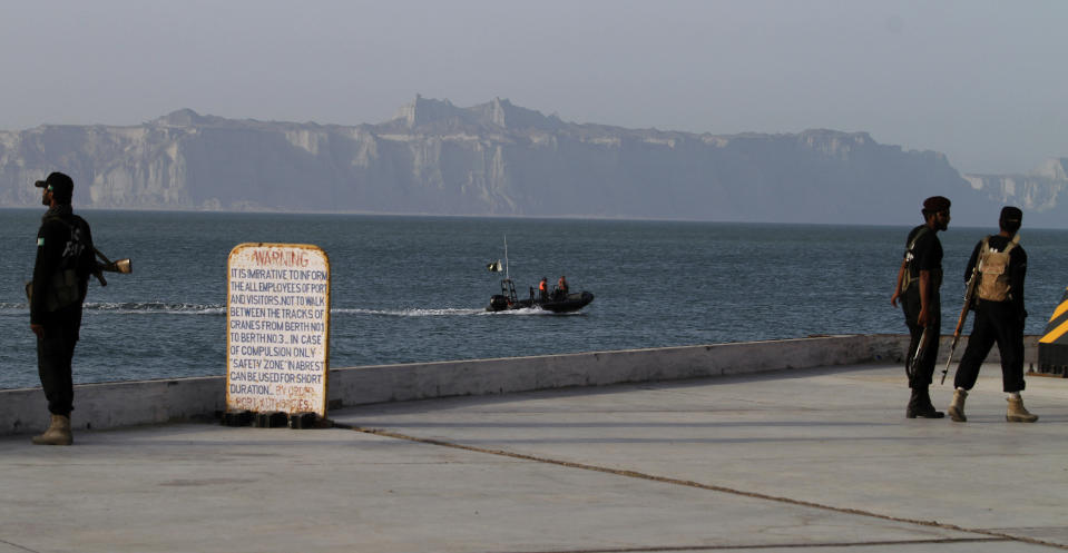 FILE- Pakistani Navy soldiers patrol in Gwadar port, key to the trade portion of the China Pakistan Economic Corridor, about 700 kilometers (435 miles) west of Karachi, Pakistan, Monday, April 11, 2016. India on Friday, Aug. 12, 2022, criticized China's decision to block the imposition of U.N. sanctions sought by it and the United States against the deputy chief of Jaish-e-Mohammad, a Pakistan-based extremist group designated by the United Nations as a terrorist organization. (AP Photo/Anjum Naveed)