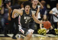 Washington State forward CJ Elleby drives up the court with the ball against Colorado in the first half of an NCAA college basketball game Thursday, Jan. 23, 2020, in Boulder, Colo. (AP Photo/David Zalubowski)