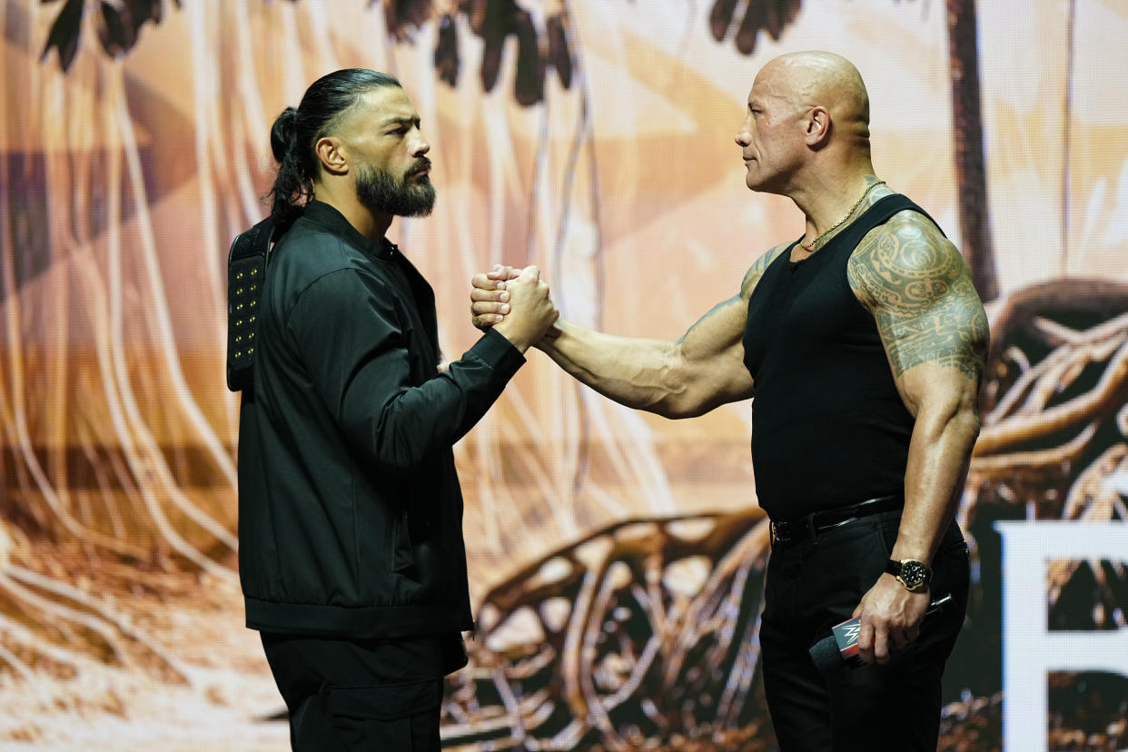 Roman Reigns and Dwayne 'The Rock' Johnson at the WrestleMania XL Kickoff