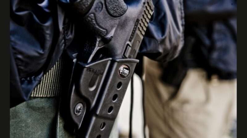 handgun in holster