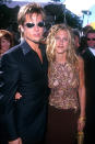 <p>Brad and Jen - His sunglasses! Her faux-dreadlocks! - look very 'of the era' at the 1999 Emmys.</p>