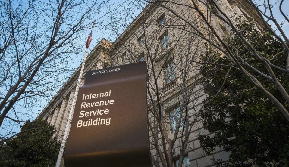FILE - In this April 13, 2014, file photo shows the Internal Revenue Service (IRS) headquarters building in Washington. If one believes the back-of-the-envelope estimates by Republican leaders on Capitol Hill, President Donald Trump's border wall is going to cost between $12 billion and $15 billion. That's a lot of money, even though it's just a minute fraction of a $4 trillion federal budget. (AP Photo/J. David Ake, File)