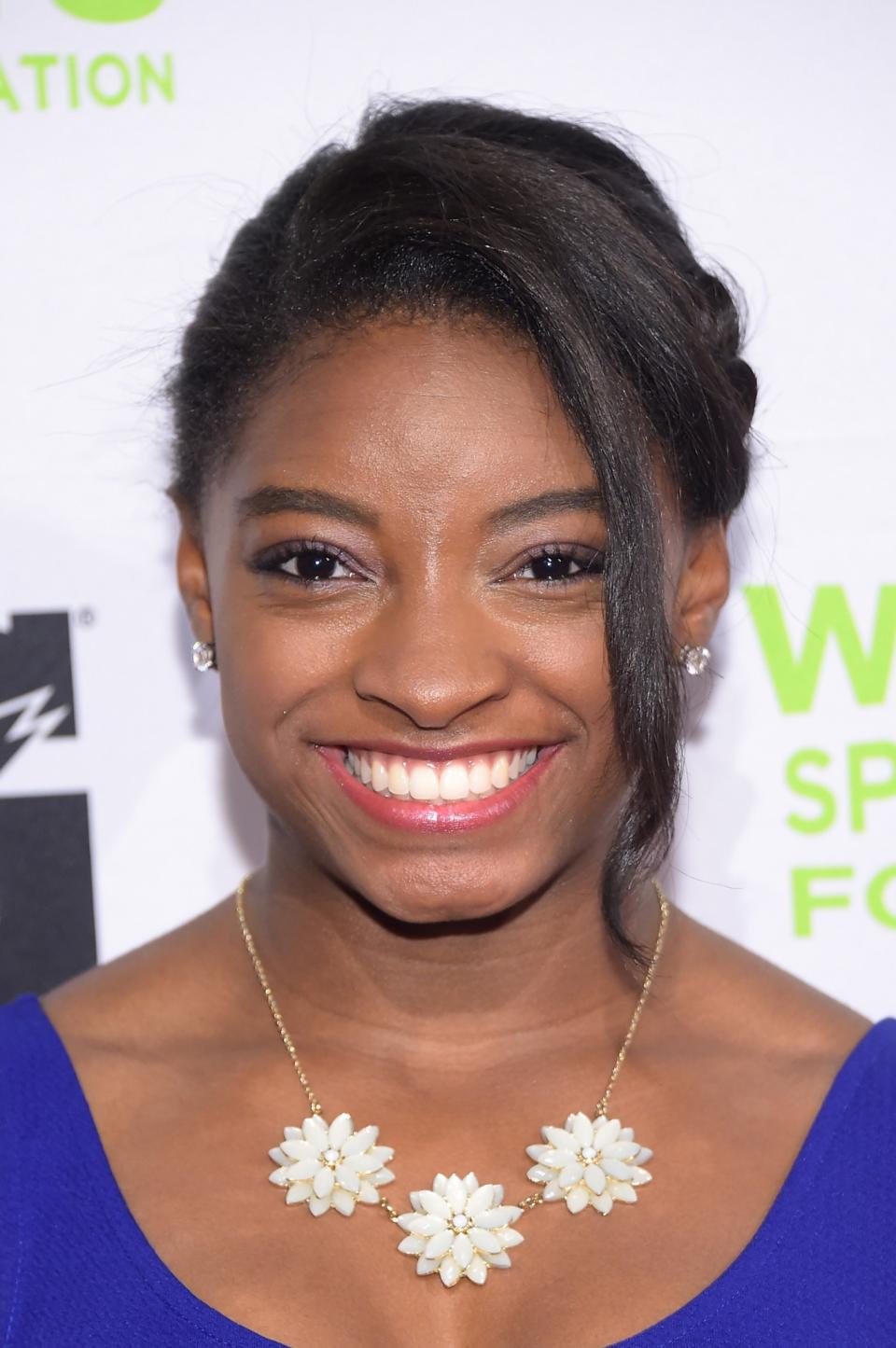 <p>Give this girl a perfect 10! Biles radiates at the Women’s Sports Foundation’s 35th Annual Salute to Women In Sports Awards. (Getty) </p>