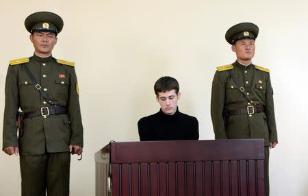 U.S. citizen Matthew Todd Miller sits in a witness box during his trial at the North Korean Supreme Court in this undated photo released by North Korea's Korean Central News Agency in Pyongyang September 14, 2014. REUTERS