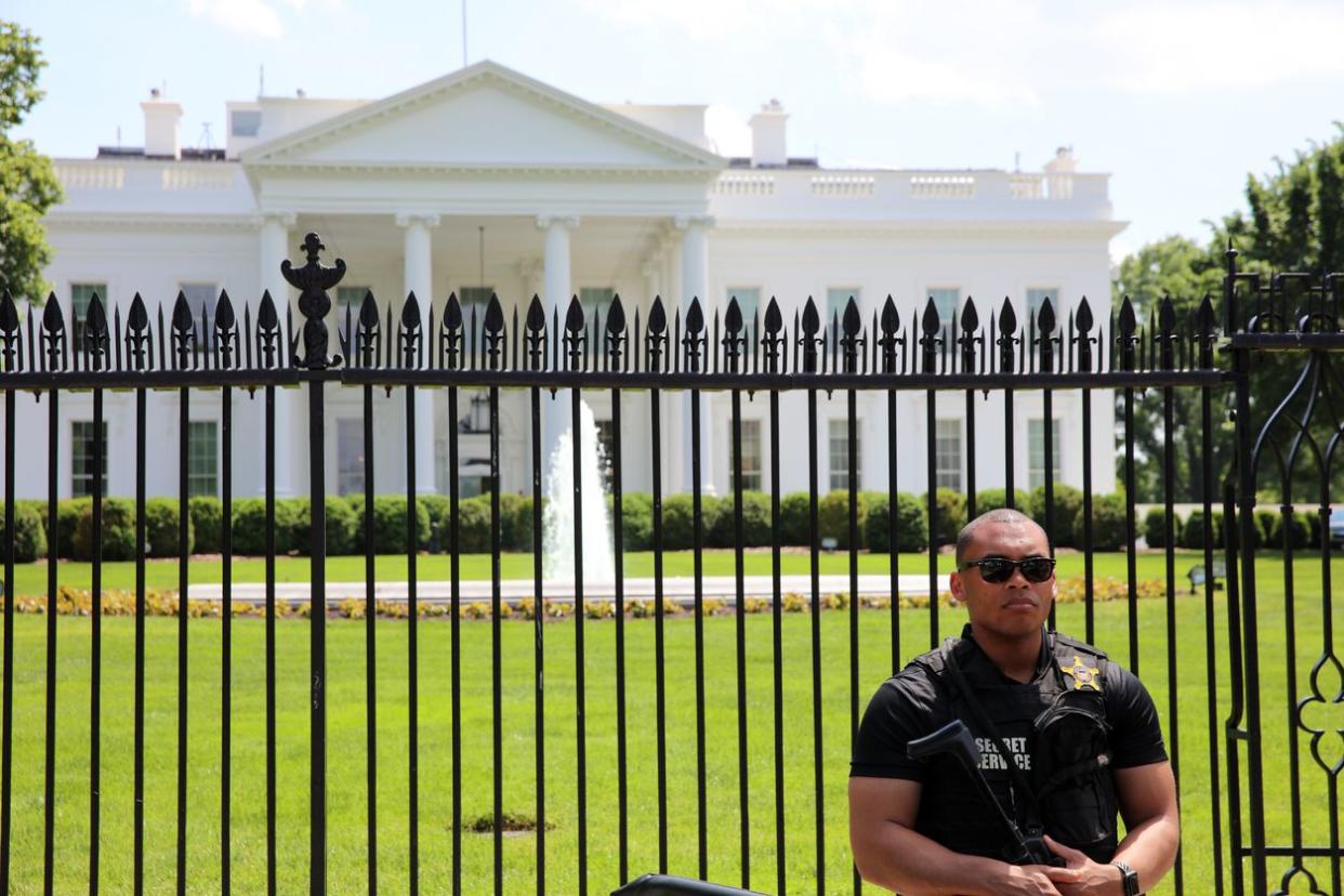 Secret Service Officer in front of White House