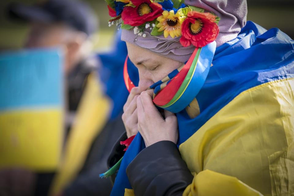 People take part in the Scotland Stands with Ukraine peace rally, outside the Scottish Parliament in Edinburgh. (Jane Barlow/PA) (PA Wire)