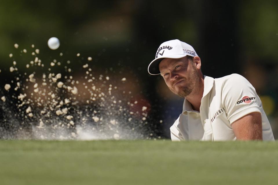 Danny Willett, of England, hits from the bunker on the seventh hole during second round at the Masters golf tournament at Augusta National Golf Club Friday, April 12, 2024, in Augusta, Ga. (AP Photo/Ashley Landis)