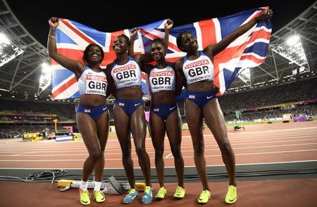 Athletics - World Athletics Championships - Women's 400 Metres Relay Final - London Stadium, London, Britain – August 12, 2017. Asha Philip, Desiree Henry, Dina Asher-Smith and Daryll Neita of Great Britain celebrate finishing second in the final. REUTERS/Dylan Martinez