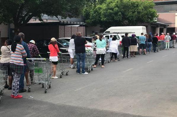 Chaotic Black Friday 2017 scenes in South Africa as supermarket Checkers offers half price deals on everything - including alcohol