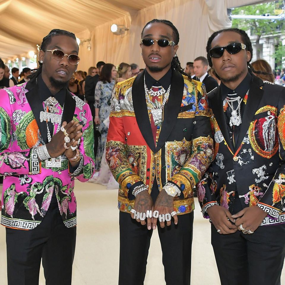 Migos did a complete 180 from their matching minimal all-black Versace suits from last year’s Met Gala.