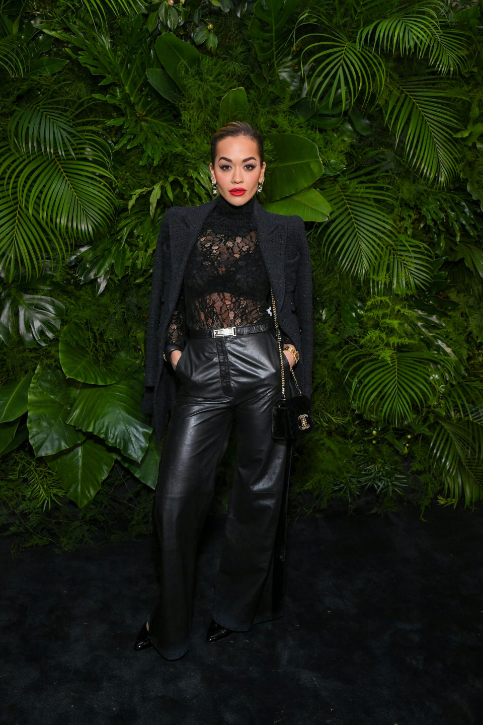 Rita Ora, wearing CHANEL attends the CHANEL and Charles Finch Pre-Oscar Awards Dinner on March 11, 2023 in Beverly Hills, California