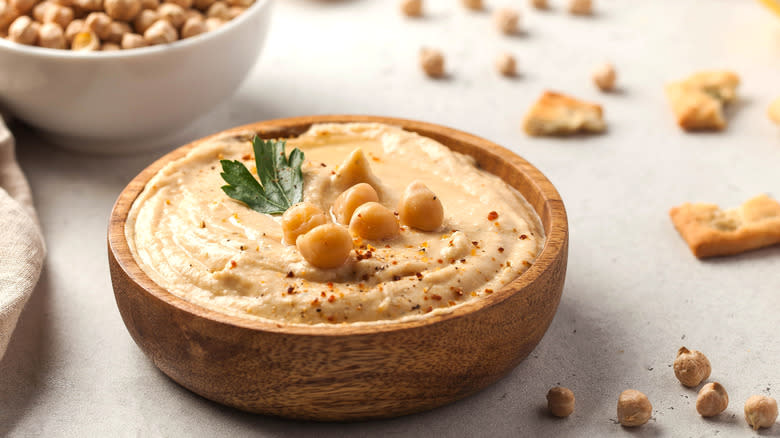 bowl of seasoned hummus with chickpeas