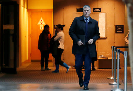 Huawei Canada Vice President of Corporate Affairs Scott Bradley exits the courtroom during a break in the B.C. Supreme Court bail hearing of Huawei CFO Meng Wanzhou, who was held on an extradition warrant in Vancouver, British Columbia, Canada December 11, 2018. REUTERS/Lindsey Wasson