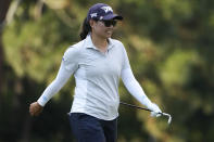 Mina Harigae reacts after chipping for a birdie on the 16th green during the first round of the U.S. Women's Open golf tournament at the Pine Needles Lodge & Golf Club in Southern Pines, N.C. on Thursday, June 2, 2022. (AP Photo/Chris Carlson)