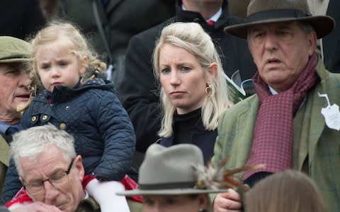 Mr Woollacott's wife and daughter at Cheltenham Festival a year after his death - Credit: Eddie Mulholland /Eddie Mulholland 