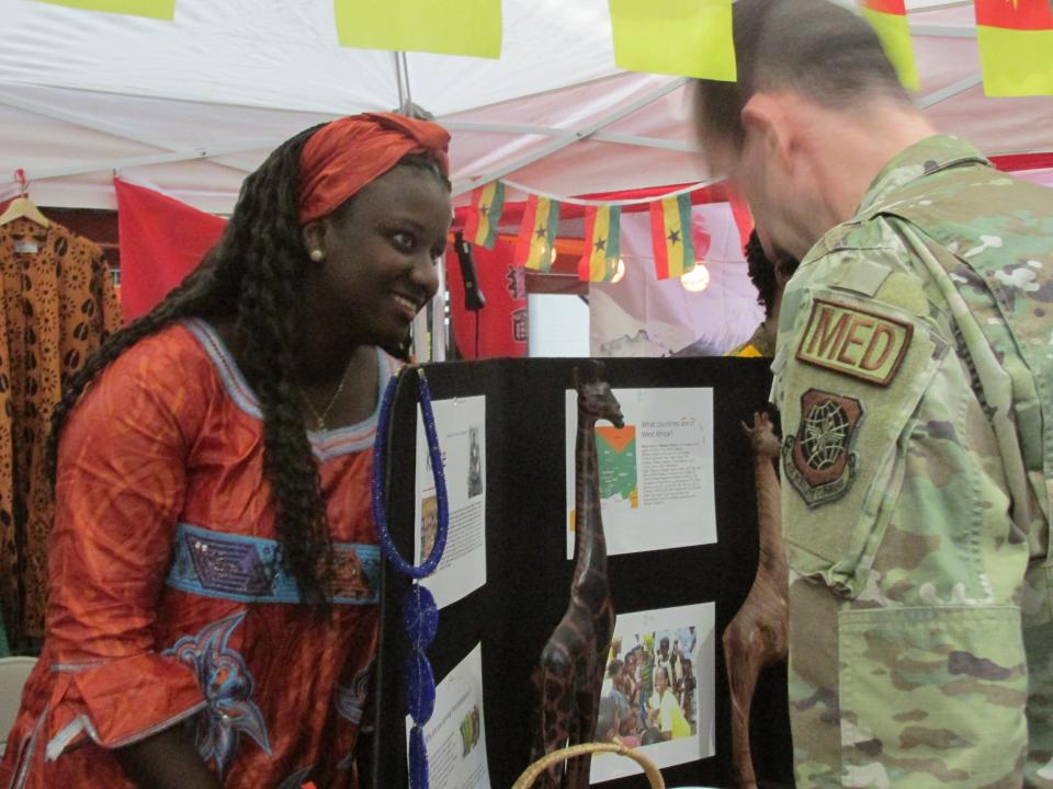 Staff Sgt. Aisatta Balde shares information about Guinea during the 3rd Annual Pope World Tour held Friday, March 1, 2024, at Pope Army Airfield.