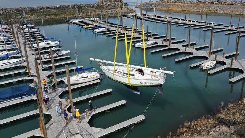 Sailboats are hoisted into the Great Salt Lake marina in Salt Lake City on Tuesday, June 6, 2023. Water levels have risen enough for sailing on the lake.