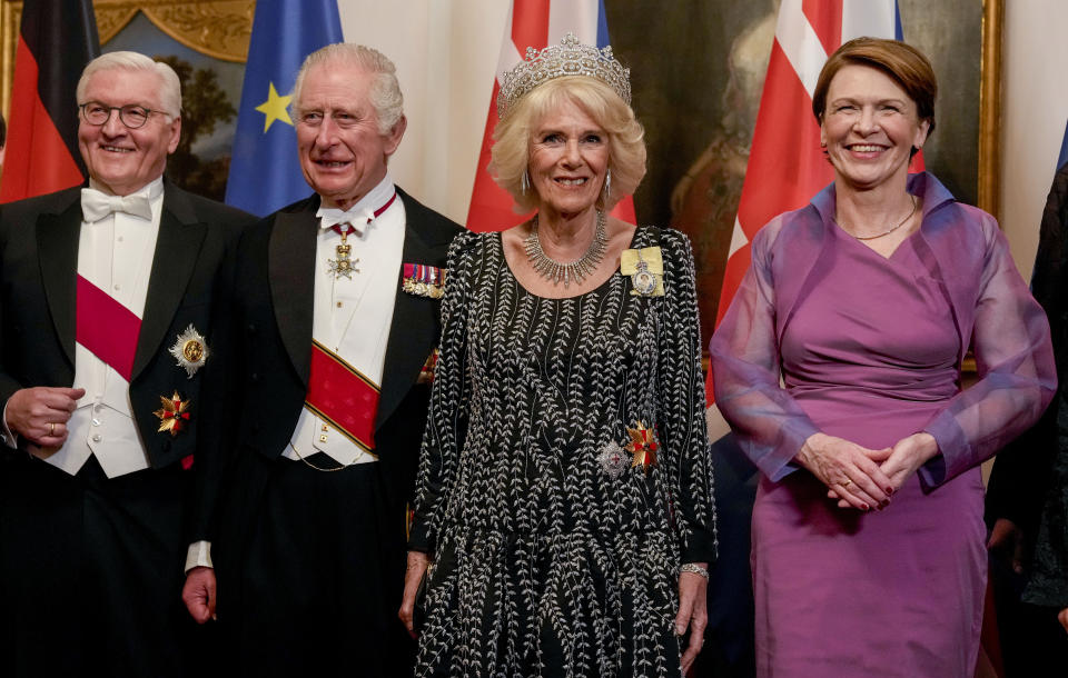 German President Frank-Walter Steinmeier, left, his wife Elke Buedenbender, right, Britain's King Charles III, 2nd left, and Camilla, the Queen Consort, stand together prior to the State Banquet in Berlin, Wednesday, March 29, 2023. King Charles III arrived Wednesday for a three-day official visit to Germany. (AP Photo/Matthias Schrader, Pool))